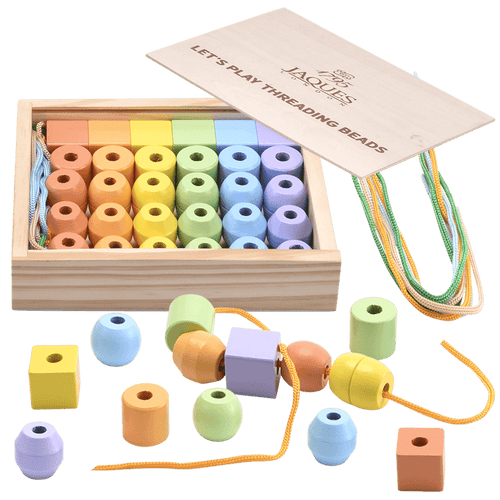 Pastel threading beads in storage box