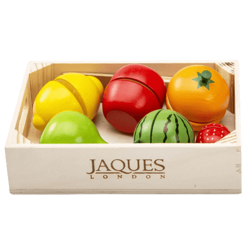 Lemon, apple, orange, pear, watermelon and strawberry in a wooden box