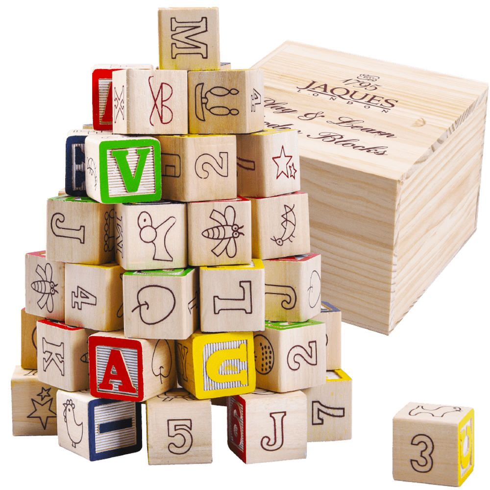 Educational blocks next to wooden storage box