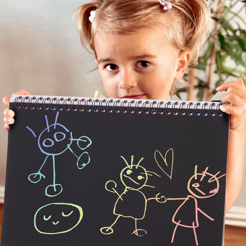 https://www.jaqueslondon.co.uk/cdn/shop/products/Kids-Rainbow-Scratch-Paper-Art-Book---Girl-holding-up-drawings---93022_x800.jpg?v=1653051054